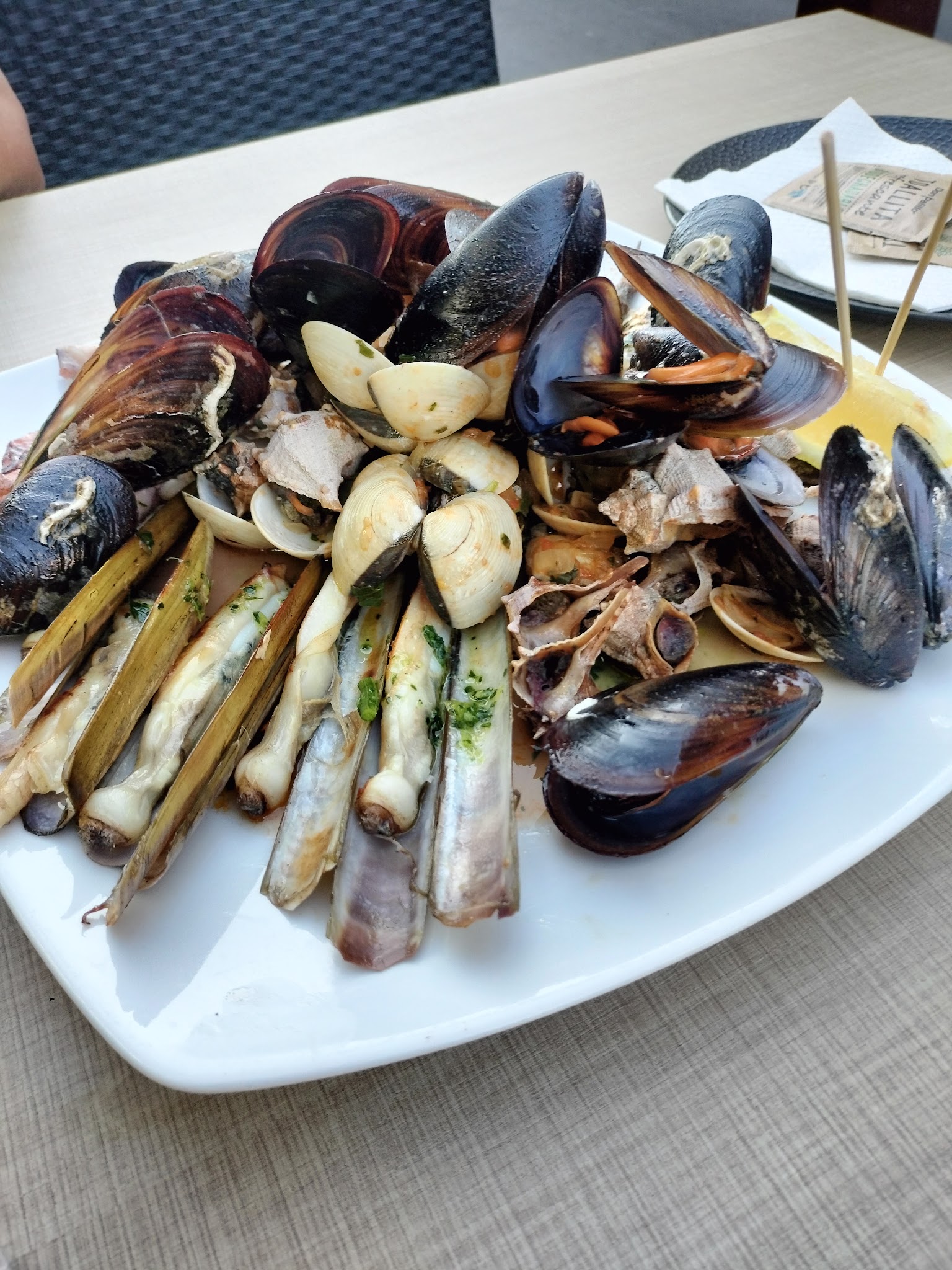 A generous platter of mussels, clams and other shellfish to share.